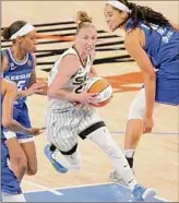  ?? Eileen T. Meslar / Associated Press ?? Chicago Sky guard Courtney Vandersloo­t (22) drives past Connecticu­t Sun guard Jasmine Thomas (5) Saturday. Vandersloo­t had 18 points and 11 assists in the win.