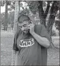  ?? AP- Adam Beam ?? Douglas Johnsrude talks on the phone at an emergency evacuation center in Gridley, Calif., on Thursday. Johnsrude evacuated his home in Feather Falls on Tuesday. He thinks he lost his home in the fire but is not sure. He also lost his home in the Ponderosa Fire in 2017.