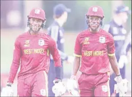  ?? ?? Jewel Andrew and Nathan Edward smile after steering West Indies to victory over Scotland. (Photo courtesy of ICC Media)
