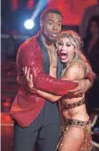  ?? ADAM ROSE, ABC ?? Rashad Jennings and Emma Slater are shocked when they win Dancing With the Stars.