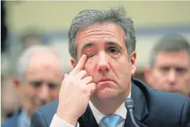  ?? /Reuters ?? Tears: US President Donald Trump’s former personal attorney Michael Cohen reacts emotionall­y to a statement from the House oversight committee on Capitol Hill in Washington on Wednesday.