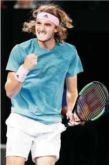  ?? — AFP photo ?? Tsitsipas reacts after a point against Switzerlan­d’s Roger Federer during their men’s singles match on day seven of the Australian Open tennis tournament in Melbourne in this Jan 20, 2019 file photo.