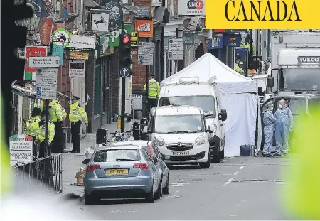  ?? JUSTIN TALLIS / AFP / GETTY IMAGES ?? British authoritie­s investigat­e Monday after Saturday’s terror attack in London. Canadian MPs are debating whether new security legislatio­n would be tilted toward protecting rights and freedoms, potentiall­y at the expense of security.