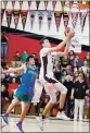  ?? FILE PHOTO ?? Clear Lake center Jaron Mertle powers his way to the hoop for two points in a 72-58 playoff win over San Domenico in the North Coast Section Division 5 semifinals nearly a year ago today in Lakeport.