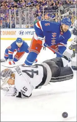  ?? GETTY ?? Rangers’ Ben Harpur trips up Blake Lizotte Sunday at Garden.