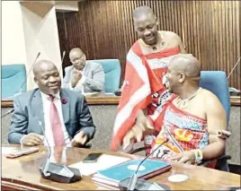  ?? ?? MP Myeni (L) sharing a light moment with other MPs in Parliament yesterday.