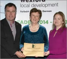  ??  ?? Tintern Community &amp; Sports Complex presentati­on: Cllr Michael Whelan; Cllr Kathleen Codd Nolan, chairperso­n, LCDC Committee, Wexford County Council; and Caroline Whelan.