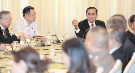  ?? CHANAT KATANYU ?? Prime Minister Gen Prayut Chan-o-cha speaks during a meeting on the Covid-19 outbreak last week at Government House.