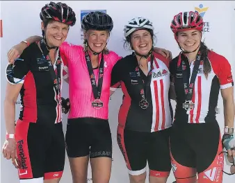  ?? SCOTT LIVINGSTON ?? Active moms Wendy Hunt, left, Kelly Christie, Corinna Wilson and Jaime Sochasky-Livingston celebrate after completing a 102-kilometre bicycle road race in September.