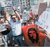  ?? RICHARD VOGEL/AP ?? DACA supporters rally Monday in Los Angeles. President Trump is likely to make a decision about DACA Tuesday.