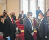  ??  ?? Willie Wilson worships with members of Philadelph­ia Romanian Church of God on Sunday in Ravenswood.