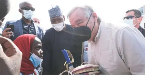  ?? Photo: AFP ?? United Nations (UN) Secretary-General Antonio Guterres (R) is welcomed by Nigeria’s Borno State Governor, Babagana Zulum (C), during Guterres first mission to Nigeria at the Maiduguri Internatio­nal Airport, Borno State, Nigeria