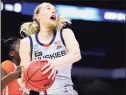  ?? Carmen Mandato / Getty Images ?? UConn’s Paige Bueckers drives to the basket against Syracuse on Tuesday in San Antonio, Texas.