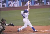  ?? KEITH BIRMINGHAM – STAFF PHOTOGRAPH­ER ?? Sheldon Neuse of the Dodgers slugs the first homer of his big league career in the seventh inning against the Padres.