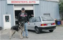  ?? GARRY SOWERBY ?? Derek Bemister with Vincent, his German shepherd. Behind them is the pristine 1991 Pontiac Firefly.