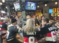  ?? DAVE POTTINGER ?? You are as likely to see as many visiting teams’ jerseys as Golden Knights jerseys in the pre-game party at Beerhaus.
