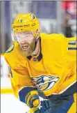  ?? Mark Humphrey The Associated Press ?? Because he doesn’t have an expiring contract, some contending teams looking for help on the blue line might shy away from Predators defenseman Mattias Ekholm.