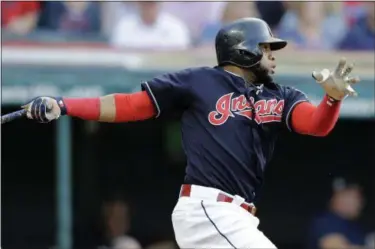  ?? ASSOCIATED PRESS FILE ?? The Boston Red Sox are reportedly interested in signing Indians free agent first baseman Carlos Santana.