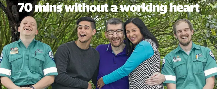  ?? PHOTO: ROSS GIBLIN/STUFF ?? Marcos Garcia, centre, shares a laugh with paramedic Jimmy Crombie, left, son Jonny Garcia, wife Kris D’Souza and paramedic James Casey, right.