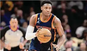  ?? Hakim Wright Sr./Associated Press ?? Knicks guard RJ Barrett dribbles up court during the second half against the Atlanta Hawks.