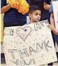  ?? [PHOTO PROVIDED] ?? A Pierce Elementary School student shows his appreciati­on for a $160,000 donation to extend and expand arts education at Oklahoma City district schools with limited budgets.