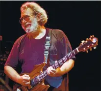  ?? ASSOCIATED PRESS ARCHIVES ?? Grateful Dead lead singer Jerry Garcia performs in Oakland in 1992. A new podcast, “Dead and Gone,” probes the 1986murder­s of two fans.