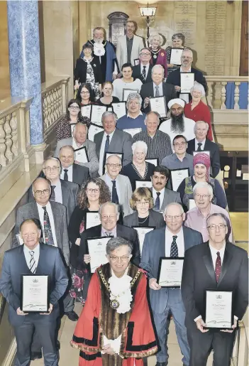  ??  ?? The awards recipients with Mayor of Peterborou­gh Chris Ash, city council chief executive Gillian Beasley and Coun Peter Hiller.