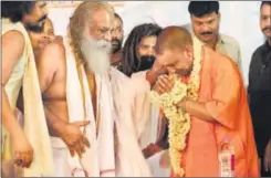  ?? HT FILE/DEEPAK GUPTA ?? Uttar Pradesh chief minister Yogi Adityanath with mahant Nritya Gopal Das in Ayodhya.