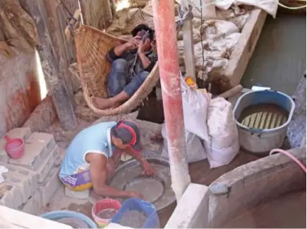  ?? Photo by Milo Brioso ?? UNDERGROUN­D ECONOMY - Miners process minerals in a small plant in Itogon, Benguet, the industry comprised of at least 25,000 could soon see change as the law on small-scale mining may be approved by the end of the year.