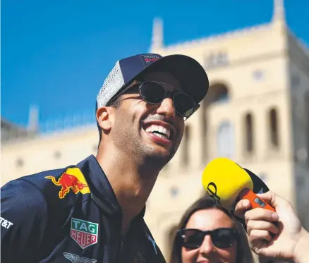  ?? SWITCH: Daniel Ricciardo of Australia and Red Bull Racing talks to media during previews ahead of the Azerbaijan Grand Prix ??