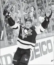  ?? Bruce Bennett Getty Images ?? JAKE GUENTZEL’S late goal gave Pittsburgh the Game 1 win. He has a league-high 10 goals in playoffs.