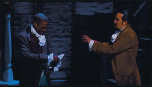  ?? DISNEY PLUS ?? Leslie Odom Jr., left, plays Aaron Burr and Lin-Manuel Miranda is Alexander Hamilton in “Hamilton,” coming to Disney Plus on Friday.