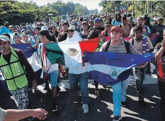 ?? RAFAEL VICTORIO/DPA TNS ?? A migrants rights activist told the Associated Press that there are only two forces driving members of the Central American caravan: “hunger and death.”