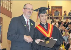  ?? CHRIS SAULNIER ?? Horton High School graduate Matthew Comeau received his diploma and honours medal from principal Brad Stokes.