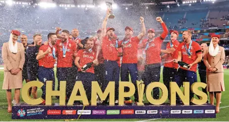  ?? (AFP) ?? England players celebrate winning the Twenty20 World Cup after beating Pakistan in the final in Melbourne on Sunday