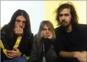  ?? AJ BARRATT — ZUMA PRESS ?? From left, Dave Grohl, Kurt Cobain and Krist Novoselic of Nirvana in London in 1992.