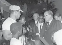  ?? Larry Sharkey Los Angeles Times ?? AFTER THE RIOTS, then-Gov. Edmund G. “Pat” Brown, right, in 1965, led the drive to relocate the campus.