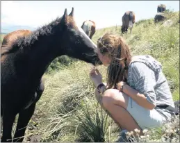  ??  ?? HORSE LISTENER: Isabel WolfGilles­pie and her horses.