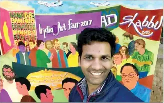  ??  ?? Akhlaq Ahmed in front of the mural pained by him for the IAF 2017, titled