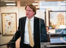  ?? ERIN SCHAFF / THE NEW YORK TIMES ?? White House counsel Don McGahn leaves a meeting on Capitol Hill on Wednesday.