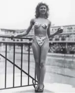  ??  ?? 0 Michele Bernardini, who had just won a ‘ prettiest swimmer’ contest, showing off the first bikini, created by the fashion designer Louis Reard, on this day in 1946