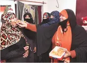  ?? PHOTO: PTI ?? Muslim women celebrate the introducti­on of the triple talaq Bill in the Lok Sabha last week. The Bill seeks to criminalis­e the practice of instant divorce among Muslims