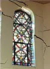  ?? Darrell Sapp/Post-Gazette ?? What mine subsidence can do: Cracks from mine subsidence frame a stained glass window of St. Joseph Church in Fairmont, W.Va. The damage resulted in the church being condemned in 1997.