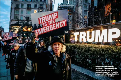  ?? Reuters ?? People gather to protest against US President Donald Trump’s declaratio­n of a national emergency to build a border wall, in Manhattan, New York on Friday. —