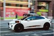  ?? Carlos Avila Gonzalez/The Chronicle ?? A Waymo autonomous vehicle makes its way down King Street on Sept. 11. Cruise is accused of hiding video of a San Francisco pedestrian incident.