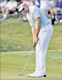  ?? AP ?? BACK IN THE CARDS: Ian Poulter sits three shots off the lead Sunday after nearly losing his PGA Tour card three weeks ago.