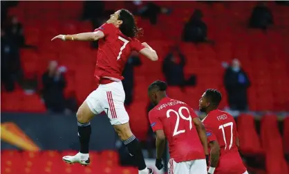  ??  ?? Manchester United’s Edinson Cavani celebrates his early strike against Granada. Photograph: Matt West/BPI/Shuttersto­ck