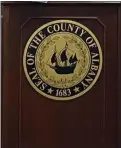  ?? FILE PHOTO ?? Albany County seal on a podium.