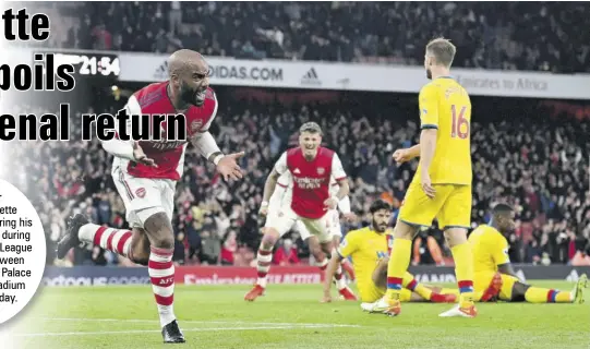  ?? ?? Arsenal’s
French striker Alexandre Lacazette (left) celebrates scoring his team’s second goal during the English Premier League football match between Arsenal and Crystal Palace at the Emirates Stadium in London yesterday.