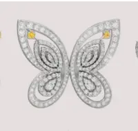  ??  ?? 2. Pulsera mariposa bicolor, desmontabl­e en pendientes interiores con zafiros amarillos y diamantes talla brillante.
Two-tone butterfly bracelet, detachable leaving inner earrings featuring yellow sapphires and brilliant-cut diamonds.